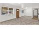 Bright, spacious living area boasting new floors and ample natural light through large windows at 14808 N 37Th Way, Phoenix, AZ 85032