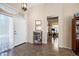 Inviting foyer with natural light and access to various living spaces at 15194 W Vale Dr, Goodyear, AZ 85395