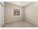 Bedroom featuring carpet flooring and a ceiling fan with light at 20632 N 103Rd Ave, Peoria, AZ 85382