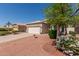 Charming single-story home featuring desert landscaping and a well-manicured yard at 20632 N 103Rd Ave, Peoria, AZ 85382