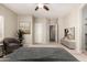 Serene main bedroom with ample space, soft lighting, and plush decor at 20632 N 103Rd Ave, Peoria, AZ 85382