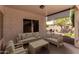 Relaxing covered patio with stylish outdoor seating perfect for entertaining or enjoying a quiet moment at 20632 N 103Rd Ave, Peoria, AZ 85382