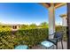 Relaxing balcony with seating, privacy screen, and views of the neighborhood at 2090 S Dorsey Ln # 1019, Tempe, AZ 85282