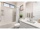 Full bathroom with a shower-tub combo, white subway tile, and a sink vanity with ample counter space at 2090 S Dorsey Ln # 1019, Tempe, AZ 85282