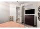 Comfortable bedroom featuring a dresser and doorway leading to a bathroom, creating a private retreat at 2090 S Dorsey Ln # 1019, Tempe, AZ 85282