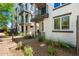 Contemporary townhome exterior with balconies and well-maintained landscaping, creating an inviting entrance at 2090 S Dorsey Ln # 1019, Tempe, AZ 85282