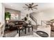 Spacious living room with a ceiling fan and staircase to the upper level at 2090 S Dorsey Ln # 1019, Tempe, AZ 85282