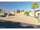 Clear view of vacant lot, bordered by block wall, with surrounding desert landscaping and neighborhood homes at 2249 N Shannon Way, Mesa, AZ 85215