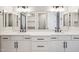 Bathroom featuring double sinks, quartz counters and modern fixtures at 2249 N Shannon Way, Mesa, AZ 85215
