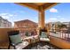 Relax on this charming balcony with comfortable seating, and neighborhood views at 240 W Juniper Ave # 1020, Gilbert, AZ 85233