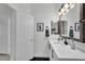 The vanity has sleek hardware and there is plenty of counter space to get ready in the morning at 240 W Juniper Ave # 1020, Gilbert, AZ 85233