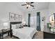 Inviting bedroom featuring a comfortable bed, ceiling fan, and coordinating nightstands at 240 W Juniper Ave # 1020, Gilbert, AZ 85233