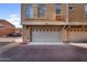 Multi car garage of a townhome at 240 W Juniper Ave # 1020, Gilbert, AZ 85233