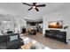 Open-concept living space seamlessly connects the living room, dining area, and a modern kitchen at 240 W Juniper Ave # 1020, Gilbert, AZ 85233