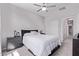 A neutrally decorated bedroom with a queen-sized bed, closet and large dresser at 2625 S Peppertree Dr # 101, Gilbert, AZ 85295
