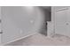 Upstairs hallway area with carpet, a door, and neutral paint at 2625 S Peppertree Dr # 101, Gilbert, AZ 85295