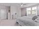 Spacious main bedroom with a window, dressers, and a large bed frame at 2625 S Peppertree Dr # 101, Gilbert, AZ 85295