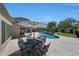 Beautiful backyard with a pool, volleyball court, seating and lush landscaping, perfect for outdoor enjoyment at 26647 N 43Rd N St, Cave Creek, AZ 85331