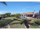 Spacious backyard with pool, large patio, and lush lawn, ideal for entertaining and enjoying outdoor living at 26647 N 43Rd N St, Cave Creek, AZ 85331