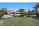 Expansive backyard with a pool, patio area, basketball court, and well-maintained lawn for Gathering activities at 26647 N 43Rd N St, Cave Creek, AZ 85331