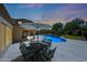 Backyard patio with dining furniture and outdoor living spaces overlooking pool, a relaxing haven at 26647 N 43Rd N St, Cave Creek, AZ 85331