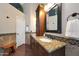 Bathroom featuring dual sinks and granite countertops at 26647 N 43Rd N St, Cave Creek, AZ 85331