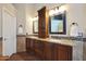 Bathroom featuring dual sinks and granite countertops at 26647 N 43Rd N St, Cave Creek, AZ 85331