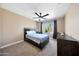 Bedroom with ceiling fan and exterior views at 26647 N 43Rd N St, Cave Creek, AZ 85331