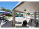 Spacious covered patio with seating and views of the lush backyard and pool area at 26647 N 43Rd N St, Cave Creek, AZ 85331