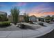 Charming single-story home features desert landscaping, a two-car garage, and a welcoming facade at 26647 N 43Rd N St, Cave Creek, AZ 85331