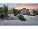 Charming single-story home features desert landscaping and a two-car garage, creating curb appeal at 26647 N 43Rd N St, Cave Creek, AZ 85331