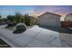 Charming single-story home features desert landscaping and a two-car garage, creating curb appeal at 26647 N 43Rd N St, Cave Creek, AZ 85331