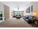 Open living room featuring neutral walls and carpeted floors at 26647 N 43Rd N St, Cave Creek, AZ 85331