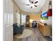 Office space with built-in cabinets, desk, stylish chair, and natural light at 26647 N 43Rd N St, Cave Creek, AZ 85331