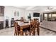 Cozy dining area adjacent to the living room and kitchen, perfect for Gathering meals and entertaining at 2747 S 85Th Way, Mesa, AZ 85209