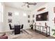 Bright home office featuring stylish furnishings, natural light, and a ceiling fan at 2747 S 85Th Way, Mesa, AZ 85209