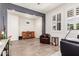 Bright living room featuring wood-look floors, natural light, and stylish furnishings at 2747 S 85Th Way, Mesa, AZ 85209