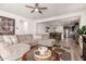 Relaxing living room featuring comfortable furniture, modern decor, and an open layout to the kitchen at 2747 S 85Th Way, Mesa, AZ 85209
