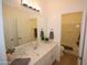 Bathroom with sink, granite countertop, large mirror and decorative accents at 28377 N Desert Native St, San Tan Valley, AZ 85143