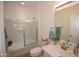 Clean bathroom featuring shower-tub combo, granite countertop, and sink at 28377 N Desert Native St, San Tan Valley, AZ 85143
