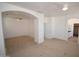 Spacious bedroom with an arched doorway and neutral colors at 28377 N Desert Native St, San Tan Valley, AZ 85143