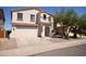 Charming two-story home with a two-car garage and neutral-colored stucco exterior in a Gathering-friendly neighborhood at 28377 N Desert Native St, San Tan Valley, AZ 85143