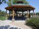 Community gazebo with picnic tables is a perfect spot for a relaxed picnic or gathering with friends and Gathering at 28377 N Desert Native St, San Tan Valley, AZ 85143