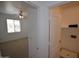 View through doorway of the laundry room with hookups and a shelf at 28377 N Desert Native St, San Tan Valley, AZ 85143
