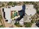 Aerial view of modern estate home featuring pool, spa, and multiple covered patios at 28729 N 107Th St, Scottsdale, AZ 85262