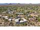 Expansive aerial view of the house in a desert community, highlighting desert landscaping and mountain views at 28729 N 107Th St, Scottsdale, AZ 85262