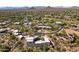 Expansive aerial view of the house in a desert community, highlighting desert landscaping and mountain views at 28729 N 107Th St, Scottsdale, AZ 85262