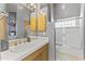 The bathroom has a tub and shower combination plus vanity with sink at 28729 N 107Th St, Scottsdale, AZ 85262