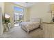 Bright bedroom features a walk-out to the pool and closet at 28729 N 107Th St, Scottsdale, AZ 85262