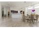 Open floor plan featuring a dining area adjacent to a kitchen at 28729 N 107Th St, Scottsdale, AZ 85262